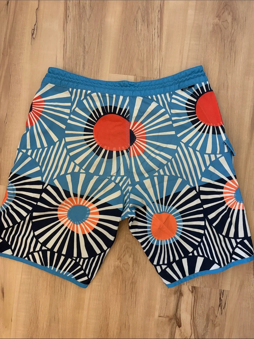 VISSLA Blue, Orange & White Radial Graphic Boardshorts